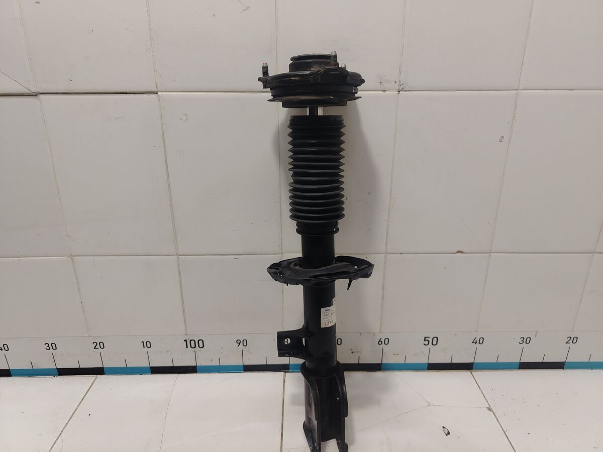 Амортизатор передний левый Kia Carnival (YP) III (2014– н.в.)