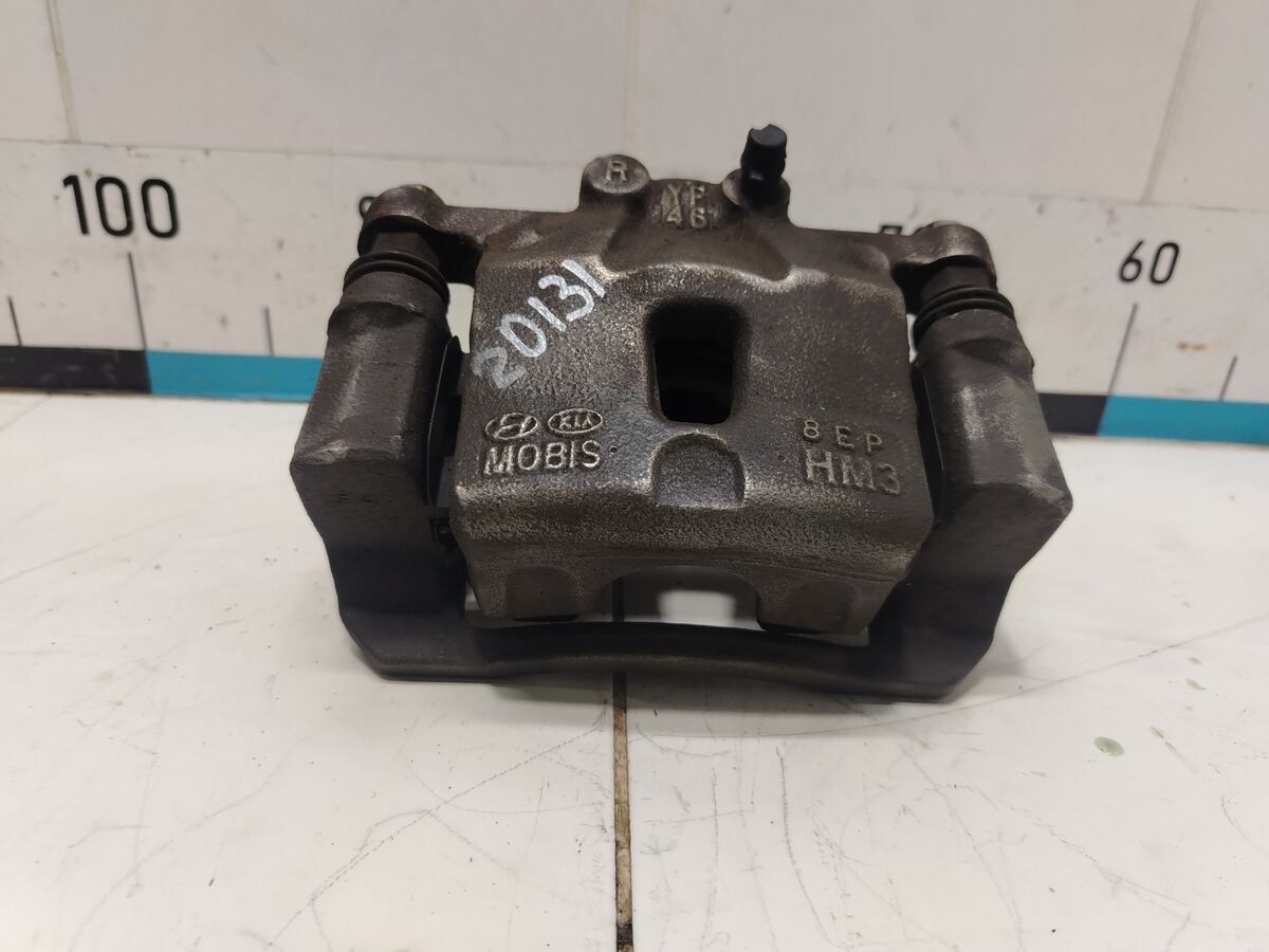 Суппорт тормозной задний правый Kia Carnival (YP) III (2014– н.в.)