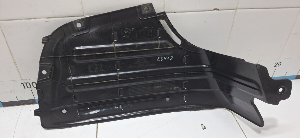 Пыльник заднего бампера левый Kia Carnival (YP) III (2014– н.в.)