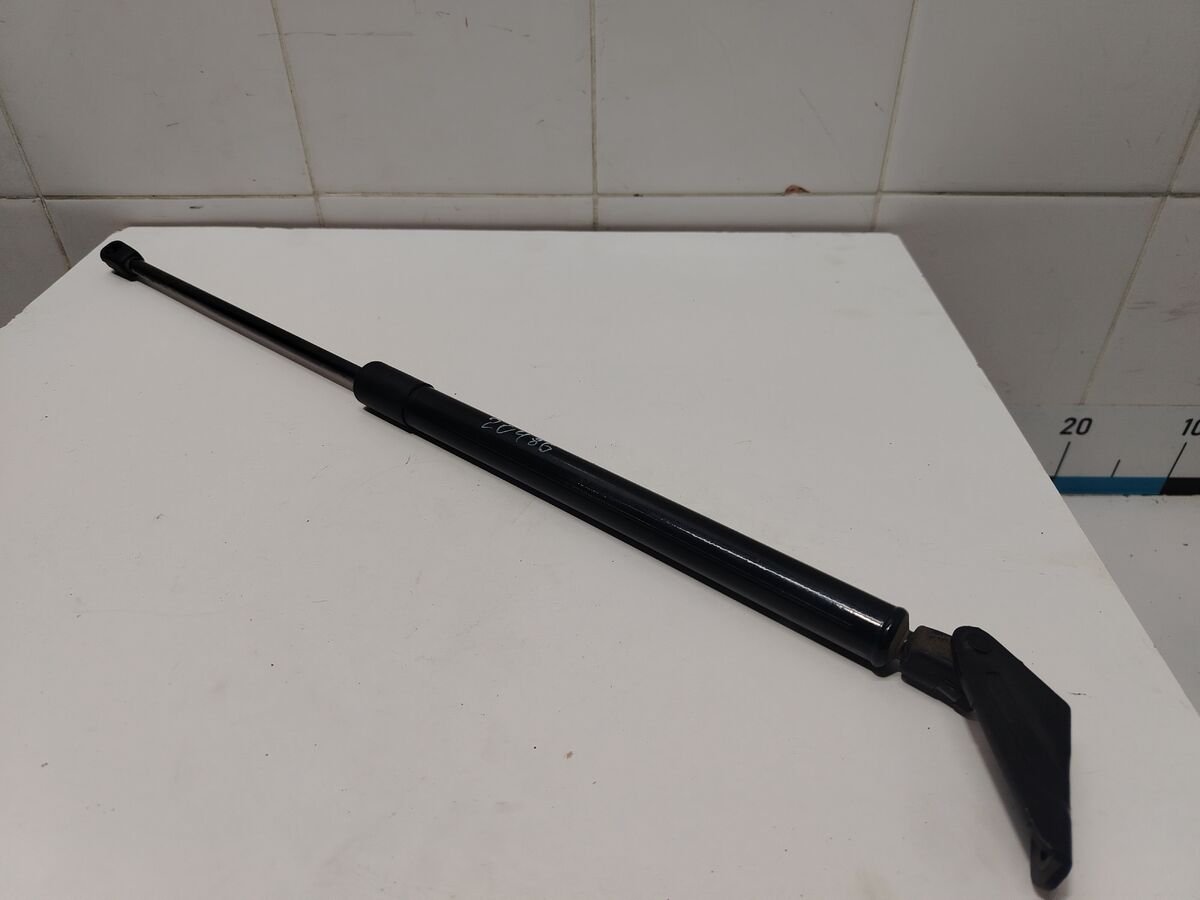 Амортизатор двери багажника левый Kia Carnival (YP) III (2014– н.в.)