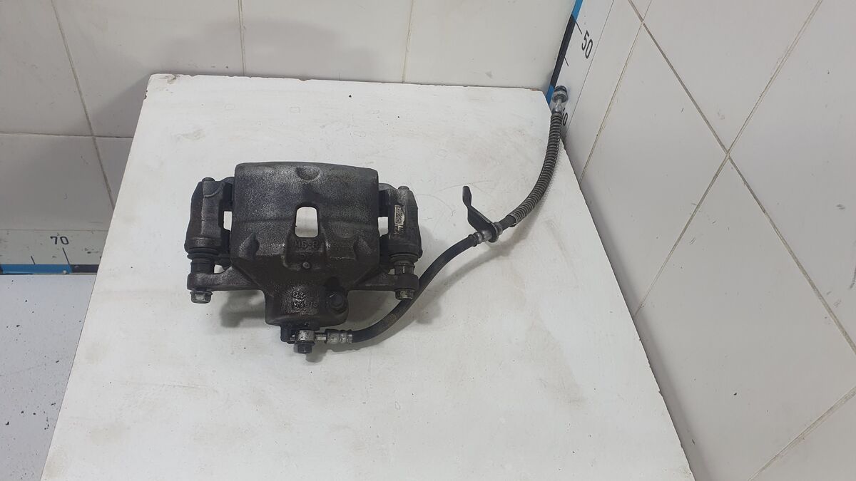 Суппорт тормозной передний правый Kia Cerato IV (2018– н.в.)