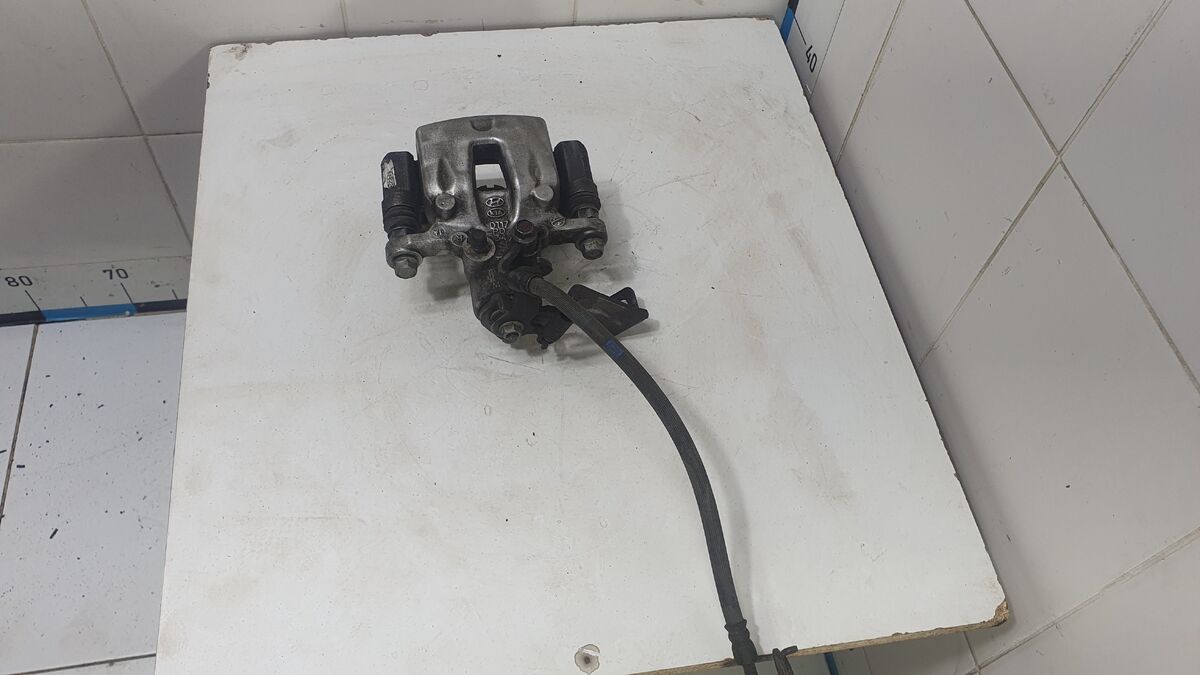 Суппорт тормозной задний правый Kia Cerato IV (2018– н.в.)