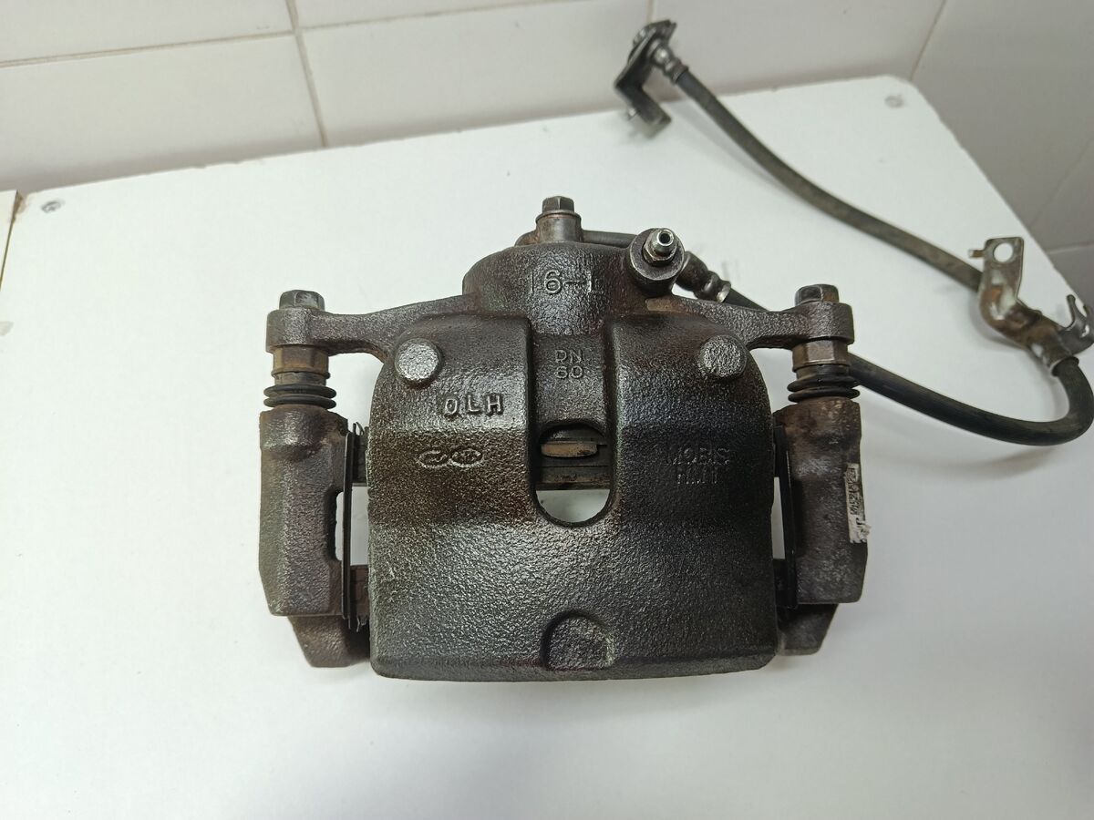 Суппорт тормозной передний левый Hyundai Sonata (DN8) VIII (2019– н.в.)