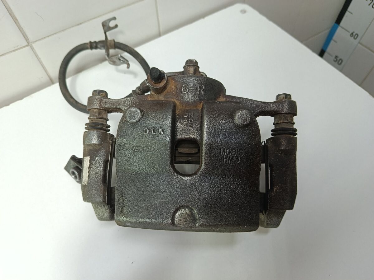 Суппорт тормозной передний правый Hyundai Sonata (DN8) VIII (2019– н.в.)