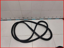 Уплотнитель двери багажника Kia Carnival 3 оригинал 2014-2021 (87321A9000)