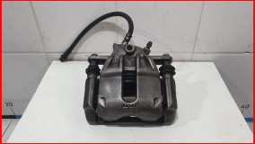 Суппорт тормозной передний левый Nissan Almera G15 2012-2018 в сборе оригинал (4101100Q0F)