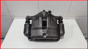 Суппорт тормозной передний левый Hyundai IX35 2013–2015 в сборе оригинал (581102Y050)