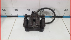 Суппорт тормозной задний левый Hyundai IX35 2009-2013 в сборе оригинал (582102Y500)