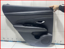 Обшивка задней левой двери Hyundai Tucson NX4 оригинал 2020-2025 83305N9070NNB